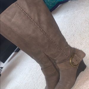 Brown washed knee high boots.